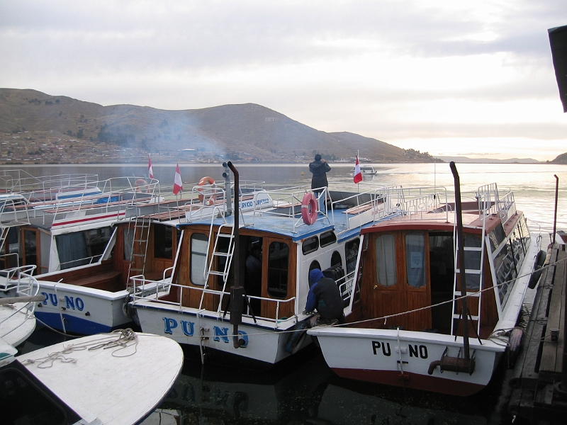0806150002.JPG - Day 9, Sunday, June 15.  Embarking on a day on Lake Titicaca.  Puno docks.