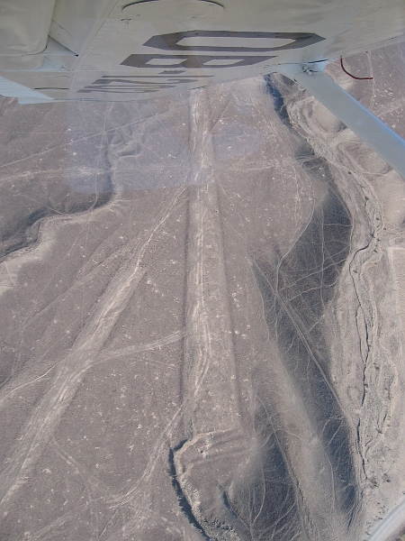 0806190009.JPG - Day 13, Thursday, June 19, Nazca. First glimpse of the Nazca Lines, believed to have been created by the Nazca culture between 200-700 BC.